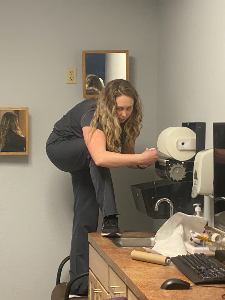 Brazos Eye staff member having fun in the clinic between patients
