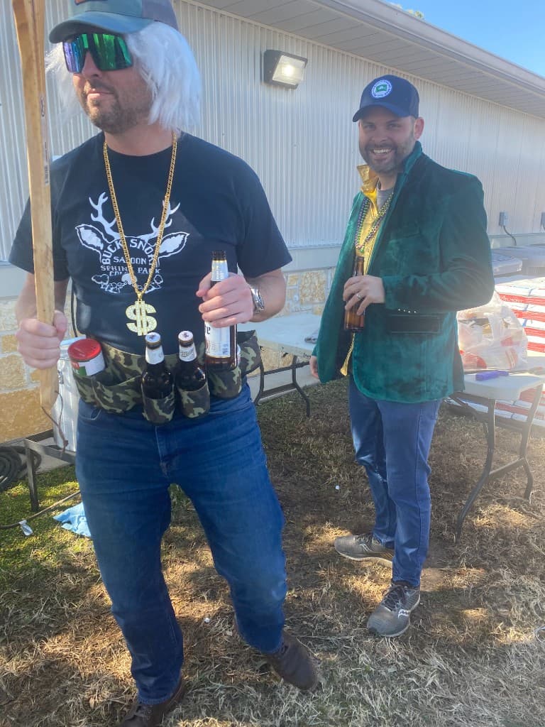 Brazos Eye team members in costume at an outdoor company party