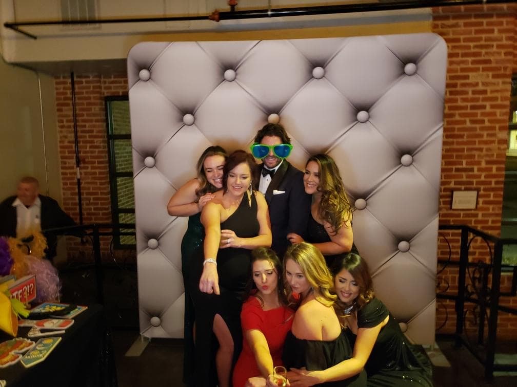 Brazos Eye team dressed up at a gala photo booth