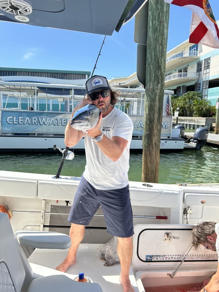 Captain Beau on the water with a fresh catch